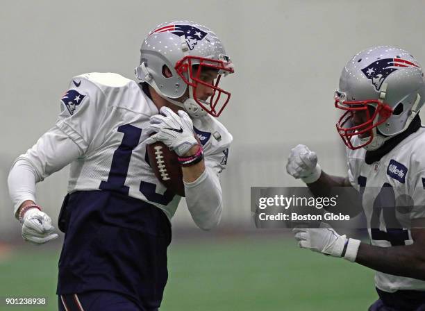 New England Patriots wide receiver Chris Hogan and New England Patriots wide receiver Brandin Cooks during a ball control drill at Patriots practice...