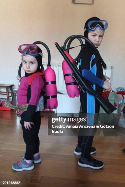 two brothers dressed as divers - scuba diving girl stock pictures, royalty-free photos & images