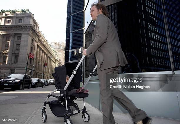 business man - baby on the move stock pictures, royalty-free photos & images