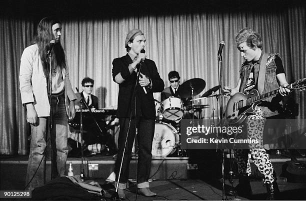 English actors Nigel Planer as Neil, Rik Mayall as Rick and Adrian Edmondson as Vyvyan in a stage version of the television sit-com 'The Young Ones',...