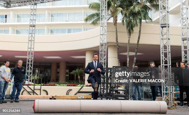 Host Seth Meyers rolls out the red carpet during the 75th Annual Golden Globe Awards Preview Day at the Beverly Hilton Hotel on January 4 in Beverly...