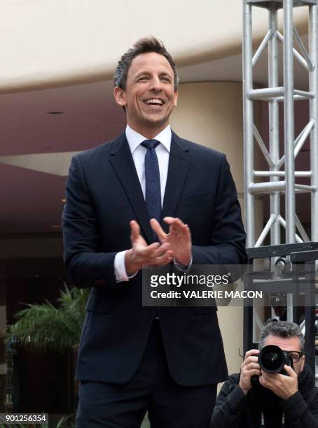 Host Seth Meyers rolls out the red carpet during the 75th Annual Golden Globe Awards Preview Day at the Beverly Hilton Hotel on January 4 in Beverly...