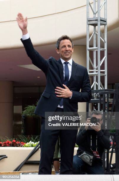 Host Seth Meyers rolls out the red carpet during the 75th Annual Golden Globe Awards Preview Day at the Beverly Hilton Hotel on January 4 in Beverly...