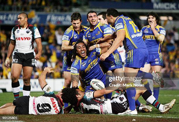 Fuifui Moimoi of the Eels celebrates scoring during the round 25 NRL match between the Parramatta Eels and the Penrith Panthers at Parramatta Stadium...