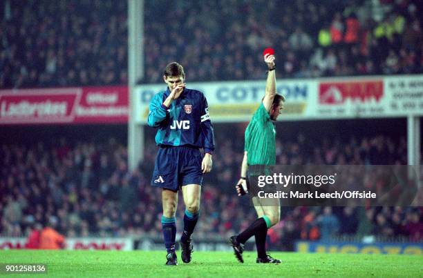 December 1995 Southampton : Premier League Football Southampton v Arsenal : Tony Adams of Arsenal is shown the red card by referee Paul Danson