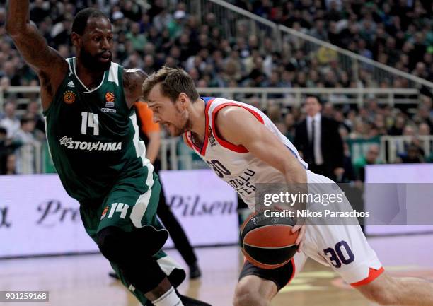 Zoran Dragic, #30 of Anadolu Efes Istanbul competes with James Gist, #14 of Panathinaikos Superfoods Athens during the 2017/2018 Turkish Airlines...