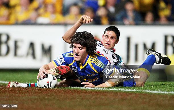 Joel Reddy of the Eels scores during the round 25 NRL match between the Parramatta Eels and the Penrith Panthers at Parramatta Stadium on August 28,...