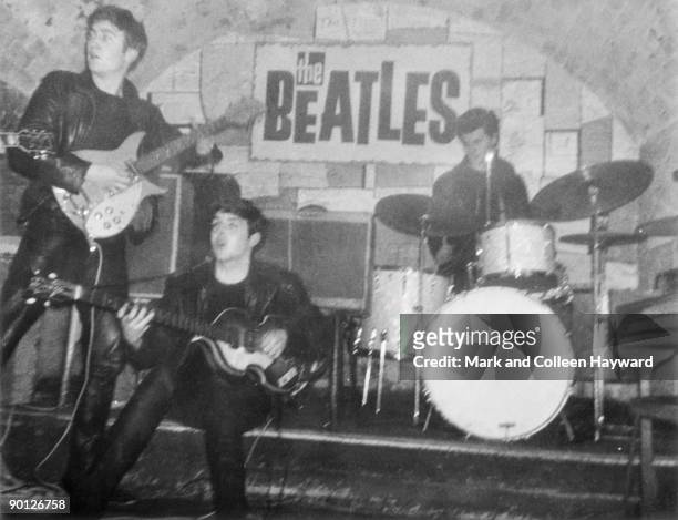 The Beatles perform in Liverpool's Cavern Club, with Pete Best on drums, 1962. Best was fired from the group that same year, and replaced with Ringo...