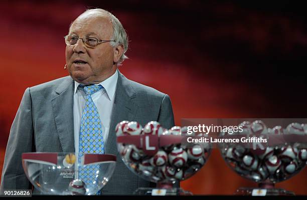 Uwe Seeler former German and Werder Bremen player draws the balls during the UEFA Europa League Group Stage Draw at the Grimaldi Forum on August 28,...