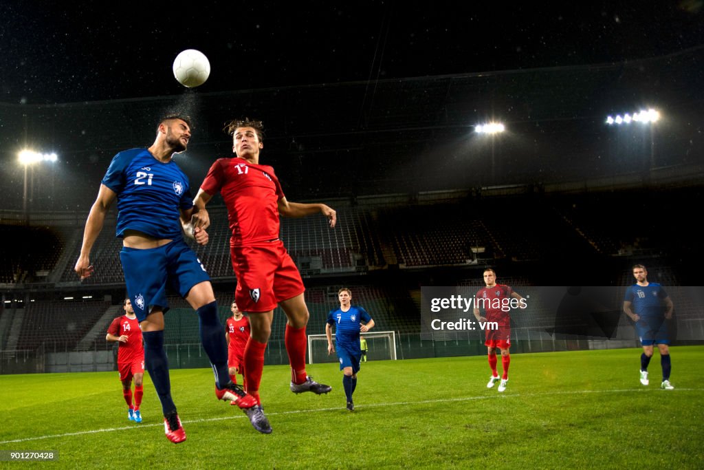 Soccer player heading the ball