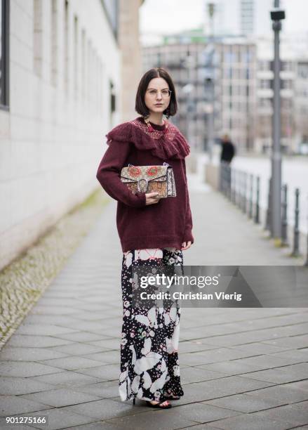 Maria Barteczko wearing floral wide leg palazzo pants Valentino, bordeaux oversized sweater with ruffles Stella McCartney, embroidered Dionysus bag...