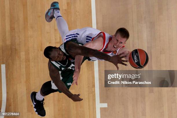 James Gist, #14 of Panathinaikos Superfoods Athens competes with Brock Motum, #12 of Anadolu Efes Istanbul during the 2017/2018 Turkish Airlines...