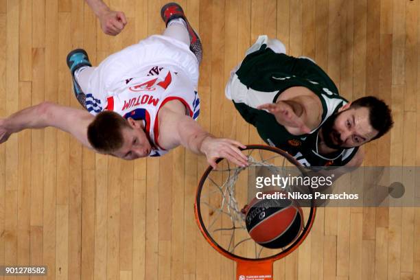 Brock Motum, #12 of Anadolu Efes Istanbul competes with Ian Vougioukas, #15 of Panathinaikos Superfoods Athens during the 2017/2018 Turkish Airlines...