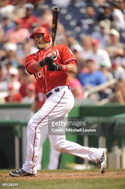 Mike Morse of the Washington Nationals takes a swing during a baseball game against the Milwaukee Brewers on August 23, 2009 at Nationals Park in...