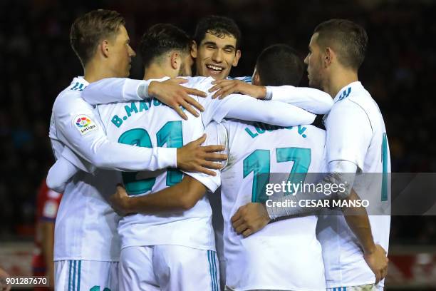 Real Madrid players celebrate a goal during the Spanish Copa del Rey round of 16 first leg football match CD Numancia vs Real Madrid CF at Nuevo...