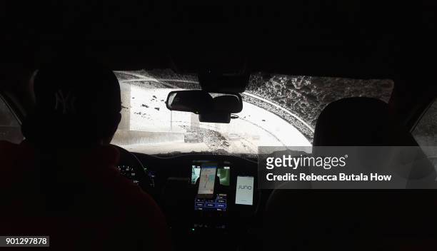 The view from inside a car en route to John F. Kennedy International Airport on January 4, 2018 in the Queens borough of New York City. A winter...