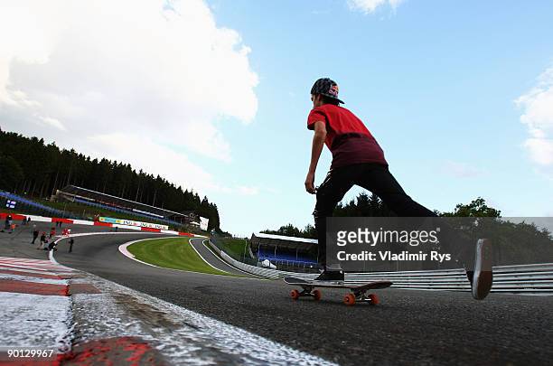 Teenage European Skateboard Champion Axel Cruysberghs skateboards down Eau Rouge following practice for the Belgian Grand Prix at the Circuit of Spa...