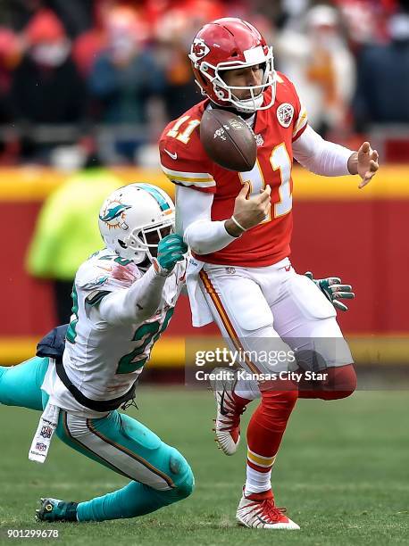 Miami Dolphins free safety Reshad Jones jarred the ball loose from Kansas City Chiefs quarterback Alex Smith in the second quarter Dec. 24, 2017 at...