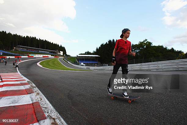 Teenage European Skateboard Champion Axel Cruysberghs skateboards down Eau Rouge following practice for the Belgian Grand Prix at the Circuit of Spa...