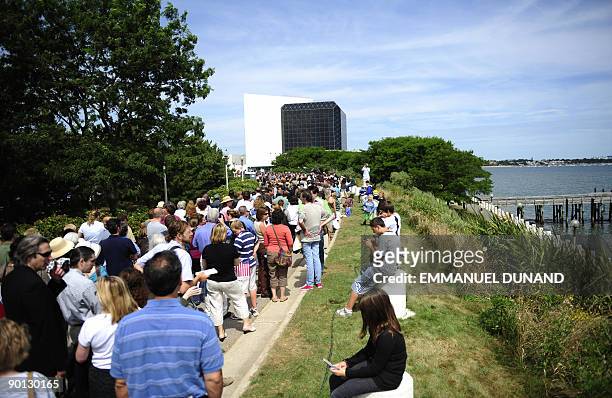 People wait in line to pay their last respects to US Senator Edward Kennedy at the John F. Kennedy Presidential Library and Museum, where Kennedy's...