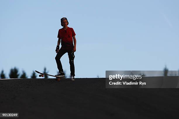 Teenage European Skateboard Champion Axel Cruysberghs skateboards down Eau Rouge following practice for the Belgian Grand Prix at the Circuit of Spa...