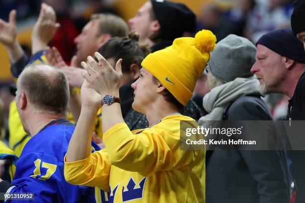 Fans cheer for Sweden in the third period against the United States during the IIHF World Junior Championship at KeyBank Center on January 4, 2018 in...