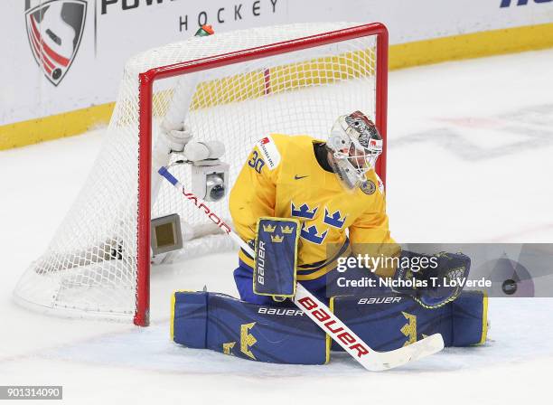 Filip Gustavsson of Sweden makes one of his 29 saves against the United States during the third period of play in the IIHF World Junior Championships...