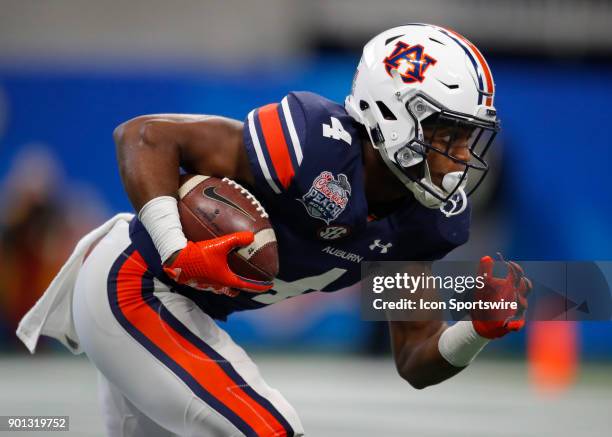 Auburn Tigers wide receiver Noah Igbinoghene during the Chick-fil-A Peach Bowl football game of the UCF Knights v Auburn Tigers at Mercedes-Benz...