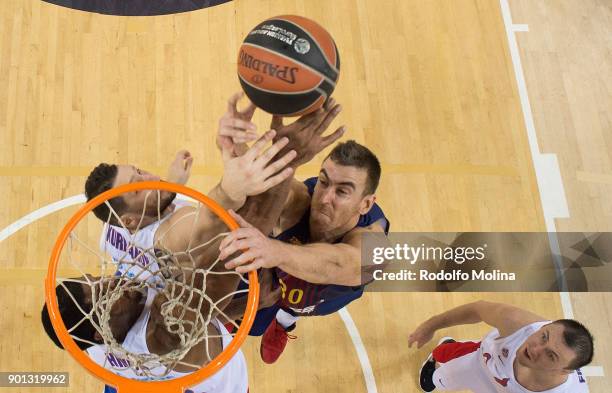 Victor Claver, #30 of FC Barcelona Lassa competes with Nikita Kurbanov, #41 of CSKA Moscow during the 2017/2018 Turkish Airlines EuroLeague Regular...