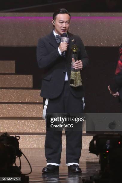 Singer Eason Chan poses with trophy during the 40th Top Ten Chinese Gold Songs Award Ceremony on January 4, 2018 in Hong Kong, China.