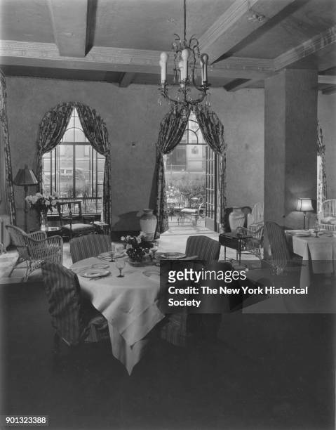 Hotel Sulgrave, 67th Street and Park Avenue, dining room with view out to terrace, New York, New York, 1929.
