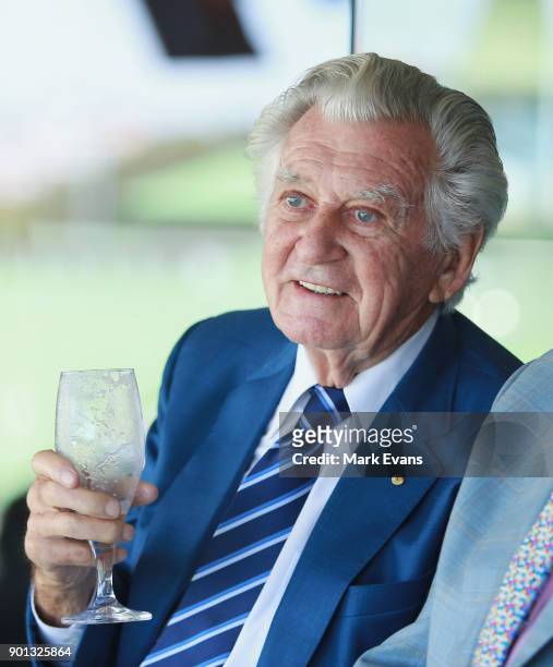Former Australian Prime Minister Bob Hawke skulls a cold beer during day two of the Fifth Test match in the 2017/18 Ashes Series between Australia...