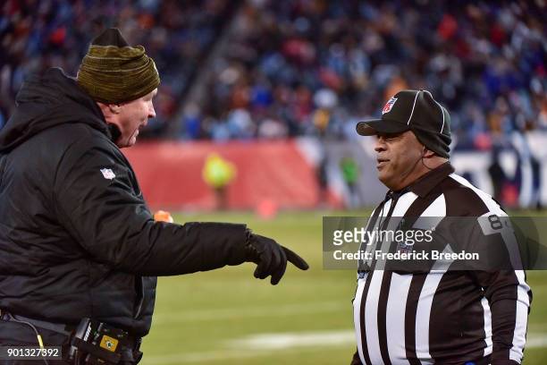 Head coach Doug Marrone of the Jacksonville Jaguars speaks to an official during a game against the Tennessee Titans at Nissan Stadium on December...