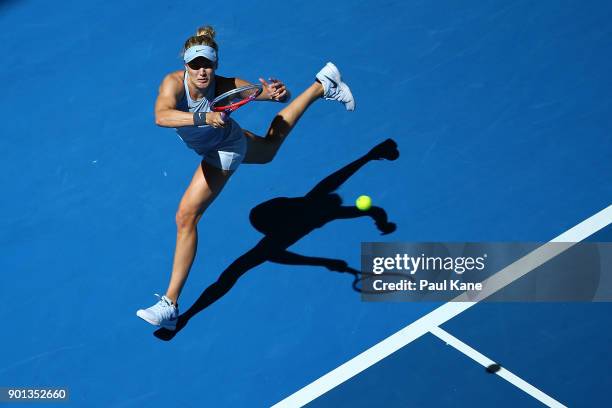 Eugenie Bouchard of Canada plays a forehand in her singles match against Elise Mertens of Belgium on day seven during the 2018 Hopman Cup at Perth...