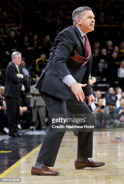 Head coach Chris Holtmann of the Ohio State Buckeyes yells in the second half against the Iowa Hawkeyes on January 4, 2018 at Carver-Hawkeye Arena,...