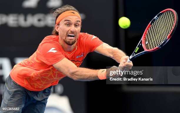 Alexandr Dolgopolov of Ukraine plays a backhand in his match against Nick Kyrgios of Australia during day six of the 2018 Brisbane International at...
