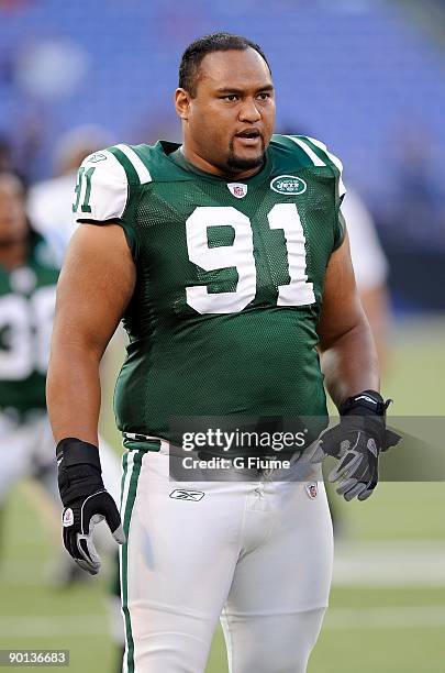 Sione Pouha of the New York Jets warms up before the preseason game against the Baltimore Ravens at M&T Bank Stadium on August 24, 2009 in Baltimore,...