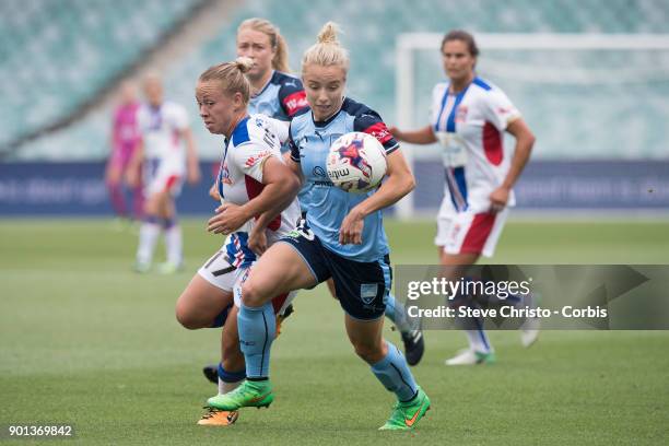 January 3: Georgia Yeoman-Dale of Sydney FC challenges Jets Jenna Kingsley for the ball during the round ten W-League match between the Sydney FC and...