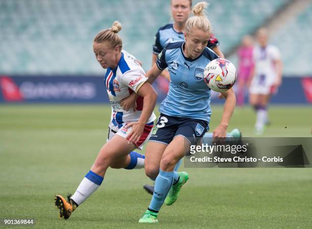January 3: Georgia Yeoman-Dale of Sydney FC challenges Jets Jenna Kingsley for the ball during the round ten W-League match between the Sydney FC and...