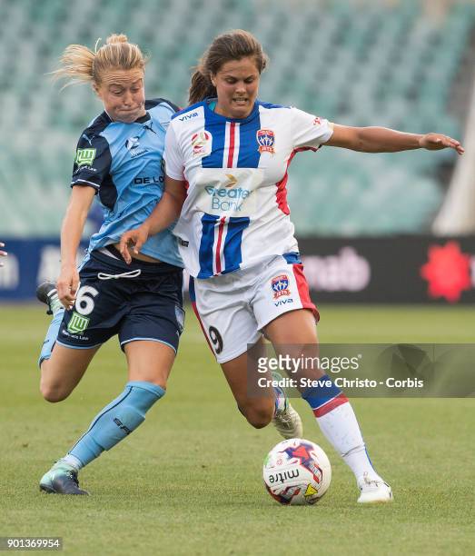 January 3: Katherine Stengel of the Newcastle Jets is tackled by Sydney FC's Emily Sonnett during the round ten W-League match between the Sydney FC...