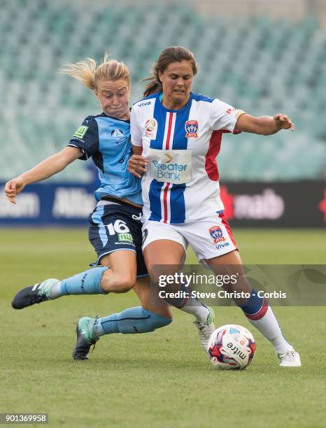 January 3: Katherine Stengel of the Newcastle Jets is tackled by Sydney FC's Emily Sonnett during the round ten W-League match between the Sydney FC...