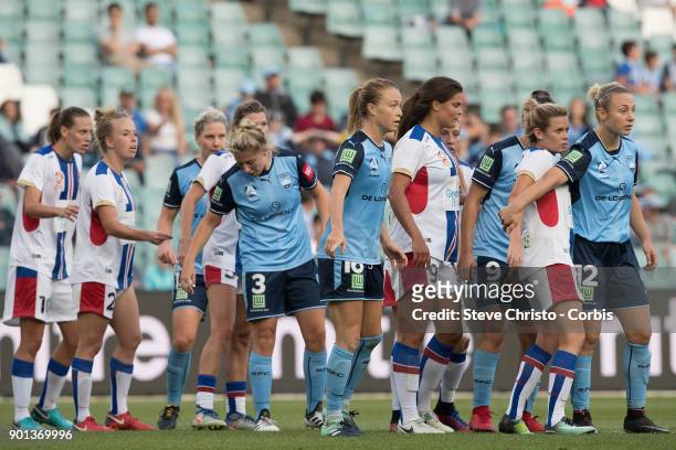 January 3: Both teams wait outside the box for a free kick to be taken during the round ten W-League match between the Sydney FC and Newcastle Jets...