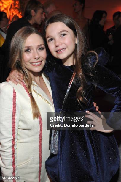 Elizabeth Olsen and Brooklynn Prince attend W Magazine's Celebration of its 'Best Performances' Portfolio and the Golden Globes with Audi, Dior, and...