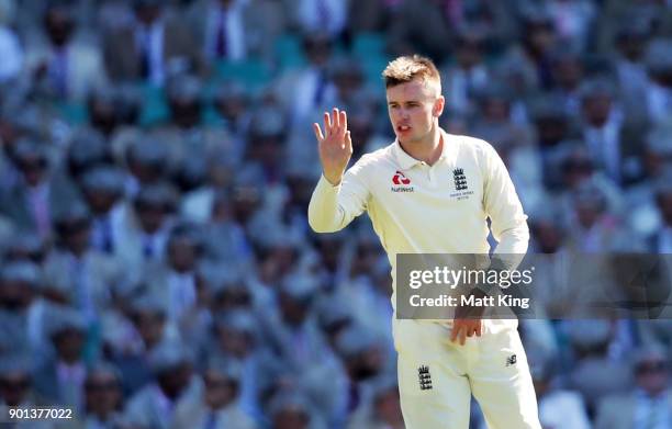 Mason Crane of England gestures to fielders during day two of the Fifth Test match in the 2017/18 Ashes Series between Australia and England at...