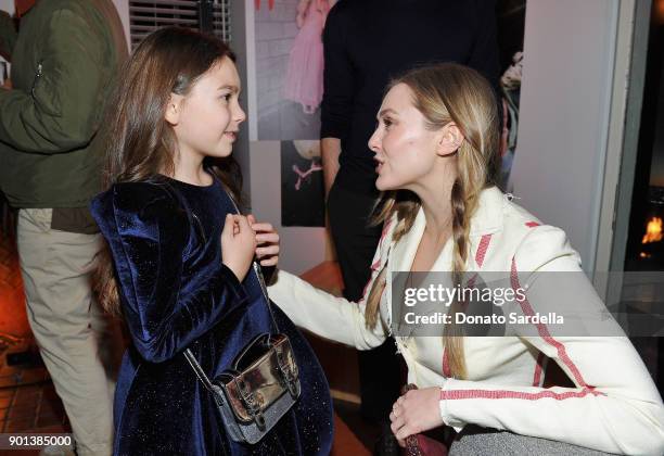 Brooklynn Prince and Elizabeth Olsen attend W Magazine's Celebration of its 'Best Performances' Portfolio and the Golden Globes with Audi, Dior, and...