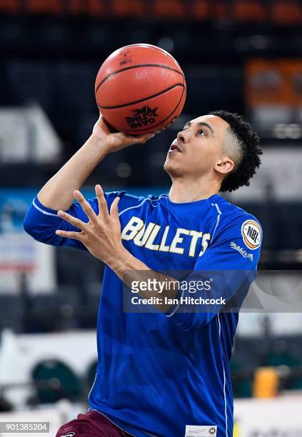 Travis Trice of the Bullets warms up before the start of the round 13 NBL match between the Cairns Taipans and the Brisbane Bullets at the Cairns...