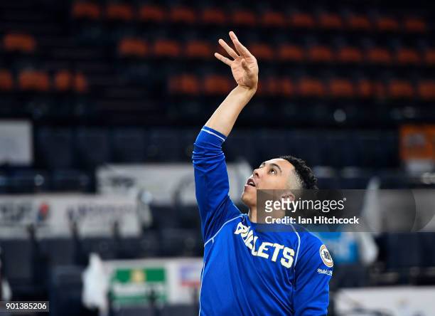 Travis Trice of the Bullets warms up before the start of the round 13 NBL match between the Cairns Taipans and the Brisbane Bullets at the Cairns...