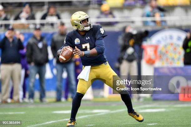 Notre Dame Fighting Irish quarterback Brandon Wimbush throws a pass during the first half of the Citrus Bowl game between the Notre Dame Fighting...