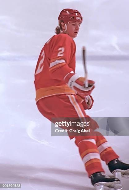Al MacInnis of the Calgary Flames skates against the Toronto Maple Leafs during NHL game action on January 26, 1987 at Maple Leaf Gardens in Toronto,...