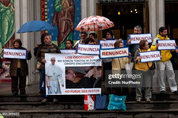 Catholics demonstrate in Osorno, Chile on 4 January 2018, outside the Cathedral against the Bishop of the city of Osorno Juan Barros questioned for...